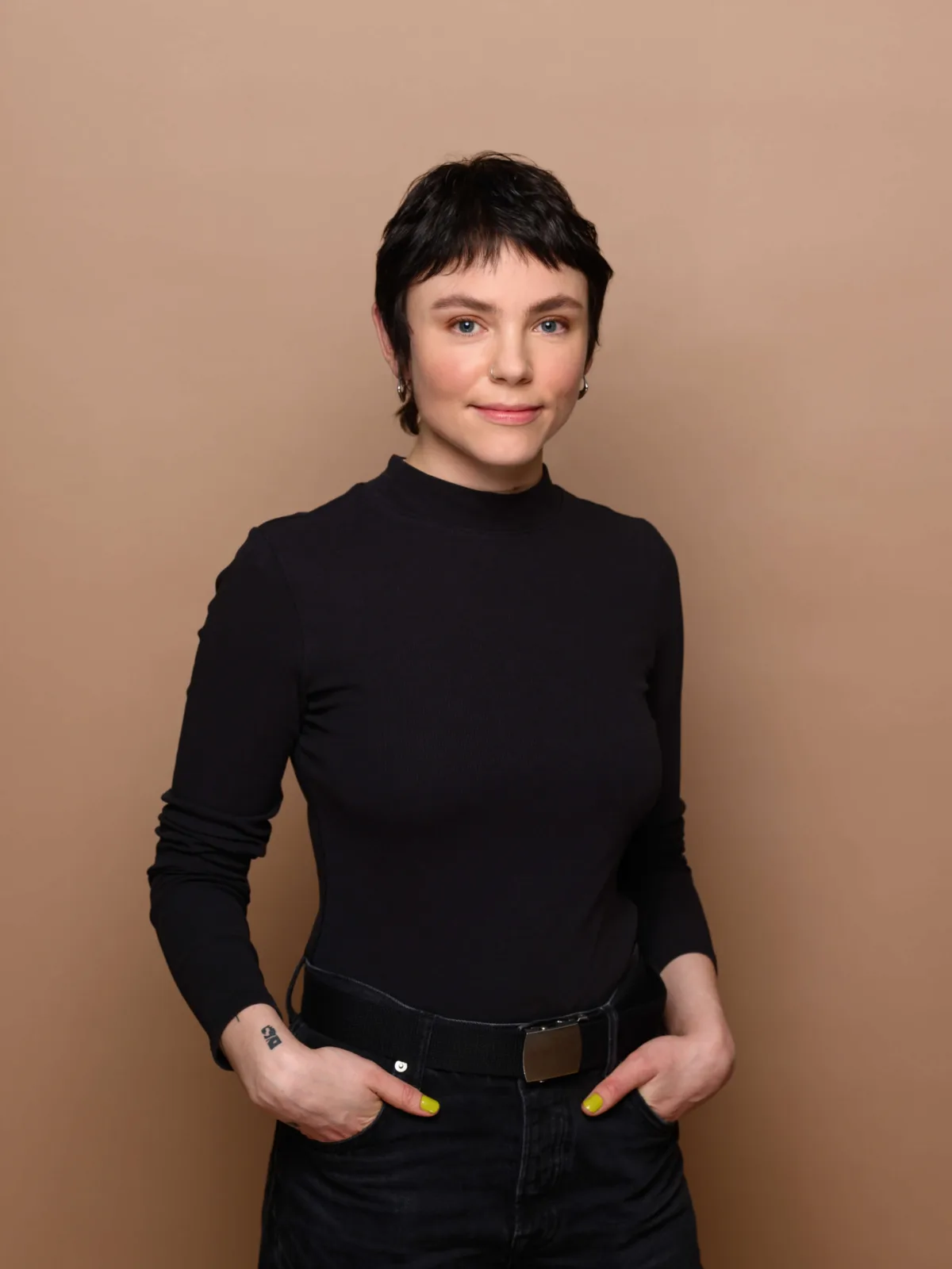 Portraitfoto von Kim Voit, Conception & Content bei hej.build